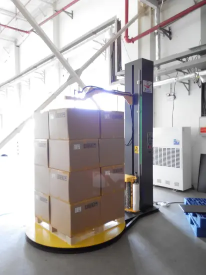 Pre-stretch pallet wrapper with top press