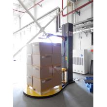 Pre-stretch pallet wrapper with top press