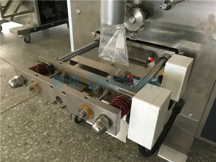 Packaging machine for rice and grains
