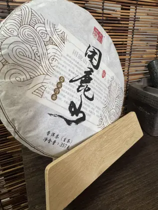 Kunlu Mountain Royal Tribute Raw Pu-erh 357g Qizi Cake | Elegant Orchid Aroma, Silky Sweet Liquor, Ancient Tea Charm