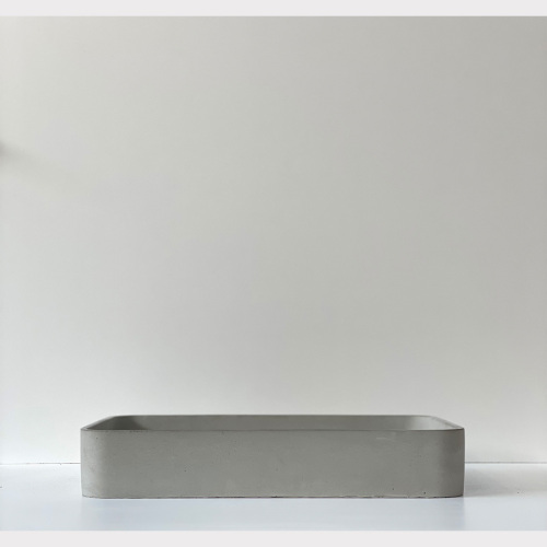 Modernes minimalistisches Beton -Rechteck -Becken im minimalistischen Stil