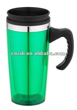 coffee mug with black handle and lid.