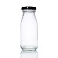 Botella de leche de vidrio de grado alimenticio con tapa de metal