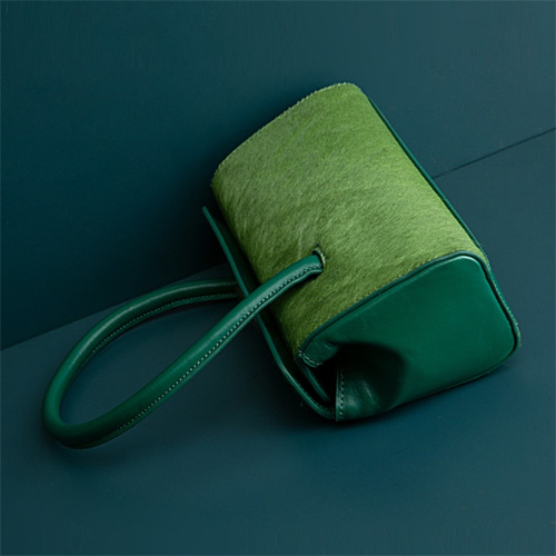 牛革と馬の毛の緑色の高貴なハンドバッグ