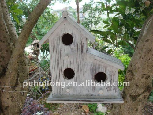 antique white wooden bird house