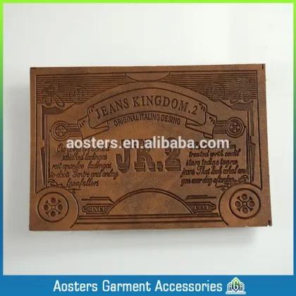 Custom clothes fabric quality jeans leather label design leather patch manufacturers