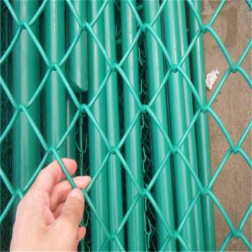 chain link fence with top barbed wire