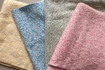 Knitted boucle wool polyester fabric for melange colours