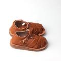 Sandalias de niño de cuero tejido populares