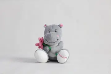 Sitting holding flowers hippo MUM a present