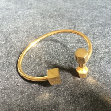 Bracciali a forma di manubri a forma di manubri quadrati a forma di quadrato