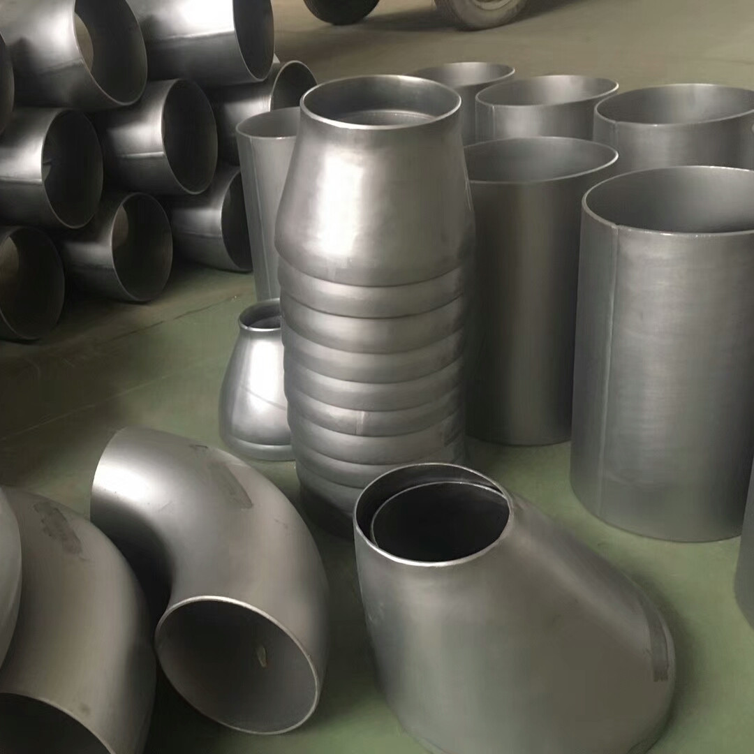 Titanium pipe fittings