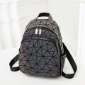 Moda de alta calidad personalizada de alta calidad PU cuero Geométrico reflectante mochilas luminosas para hombres y mujeres Lumino portátil