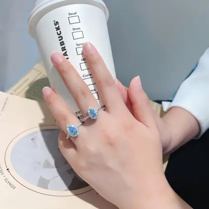 Petite Teardrop Blue Halo Diamond Ring