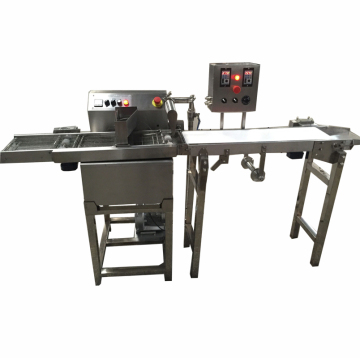 Macchine automatiche di rivestimento al cioccolato: miglioramento dell'efficienza nei processi di calcio di cioccolato