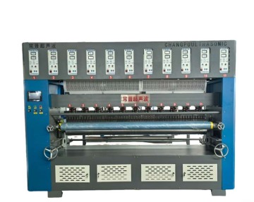 Macchina laminatrice automatica per goffratura trapuntata ad ultrasuoni