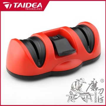 Two stage knife sharpener with suction pad