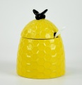 Keramik tabung makanan berbentuk lebah kuning dengan tutup