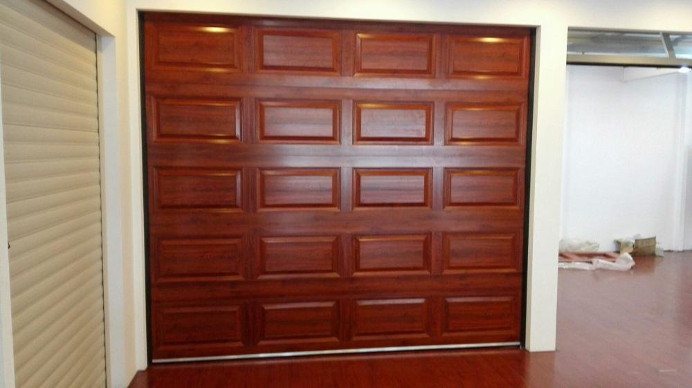 Intelligent sectional garage door