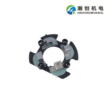 Oil pump motor brush holder
