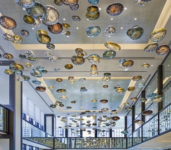 Bulk amber chandeliers used in hotel corridors