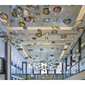 Bulk amber chandeliers used in hotel corridors