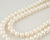 White freshwater button pearl loosen 16-inch strand on wholesale