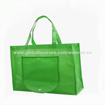 Green nonwoven shopping bag, made of nonwoven, suitable for shopping and promotional