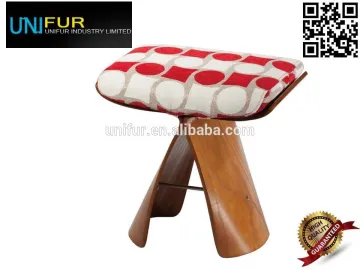 Upholstered low antique wooden bar stool for pub and living room