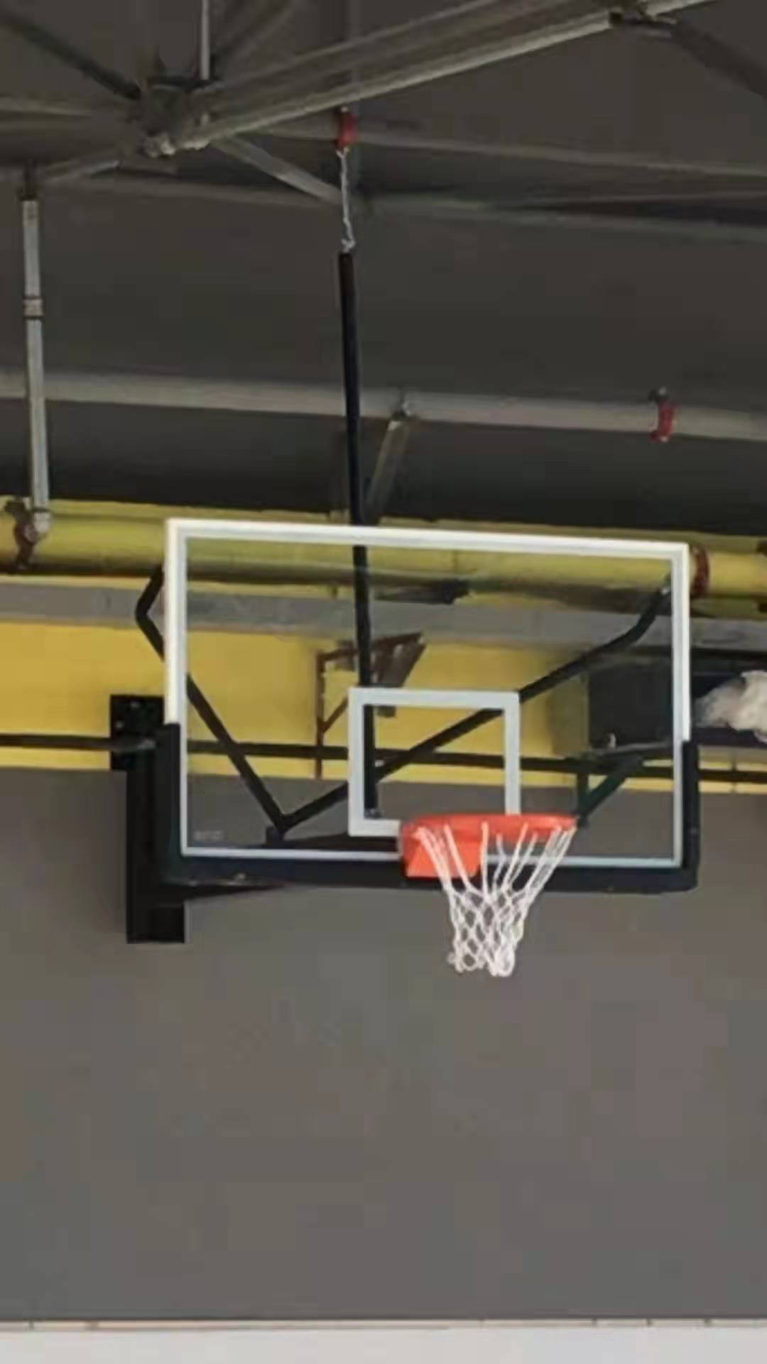 Fixed wall mounted basketball hoop