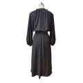 Dot Print Smocked And Tie Neckline Maxi Dress