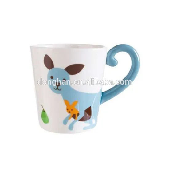ceramic mug with cat tail shaped handle