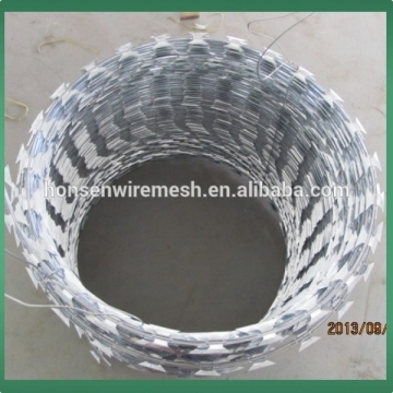 Used galvanized concertina razor barbed wire cross type BTO-30 for army security