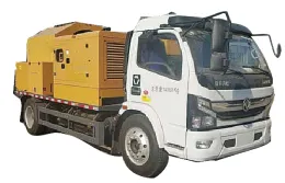 Pavement road maintenance vehicle