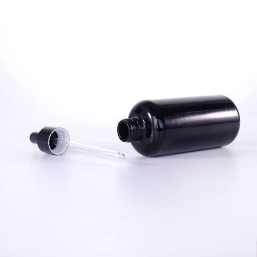 China Black round shoulder glass bottle for essential oil Factory