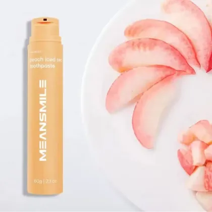 Mango flavored watermelon flavored fluoride toothpaste