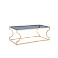 Mesa de centro de vidrio con estructura galvanizada en oro