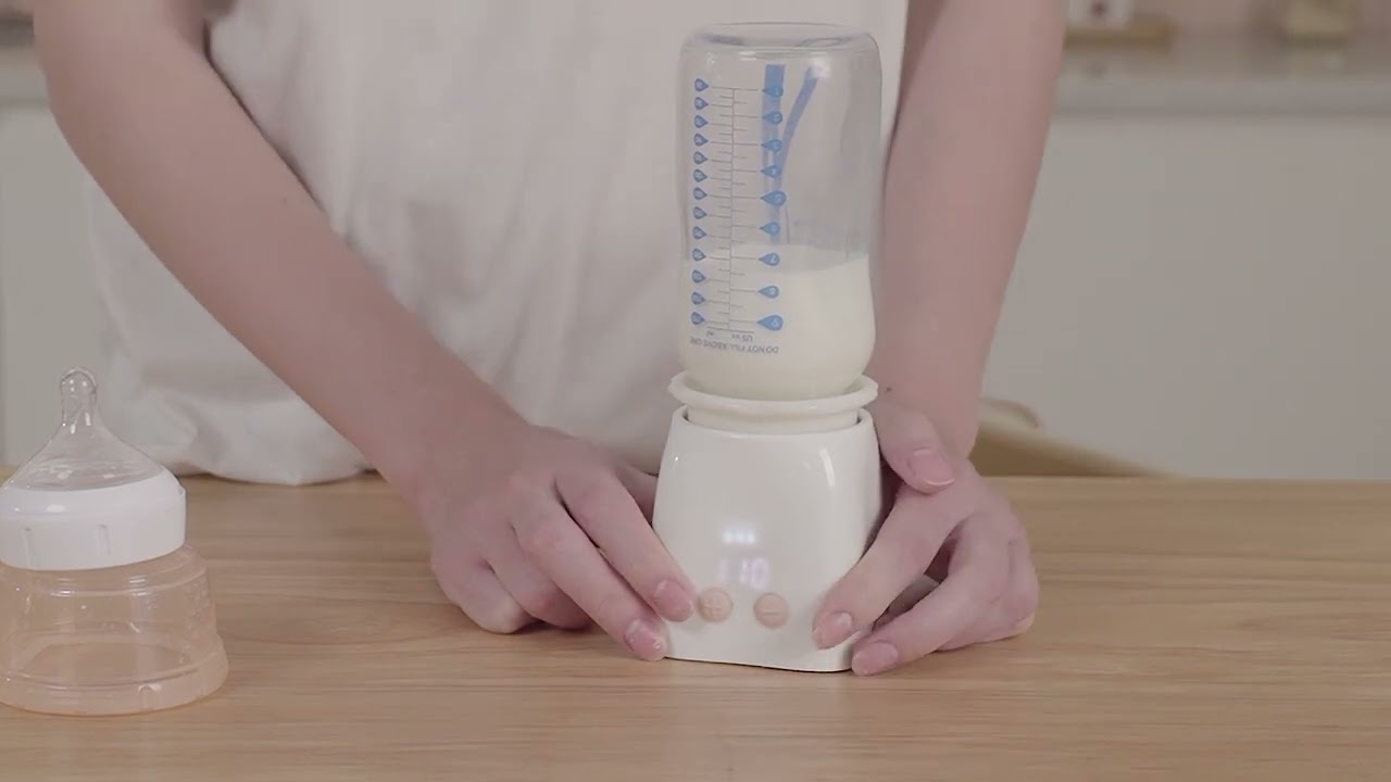 Negative pressure vacuum pump for small bottle warmers