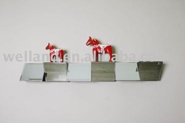 Zig-zag mirror shelf