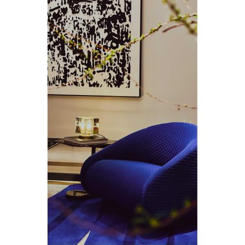 Sillón contemporáneo de madera contrachapada