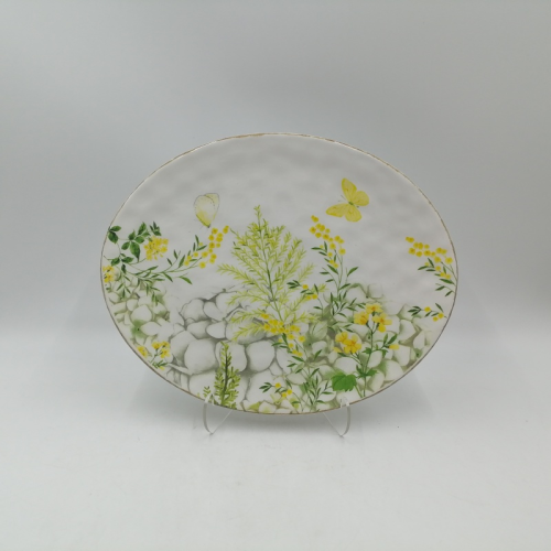 Маленькая овальная керамическая тарелка с цветочным принтом кролика
