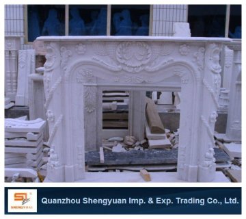 gray hand carving fireplace design