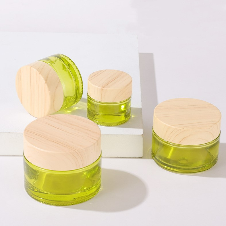 green glass jar with wooden lid