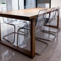 Elegant Clear Plastic Chair with Silver Legs