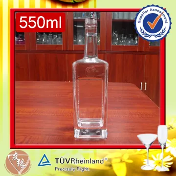 Cheap price heavy weight 550ml crystal clear custom embossed scotch whisky glass bottles