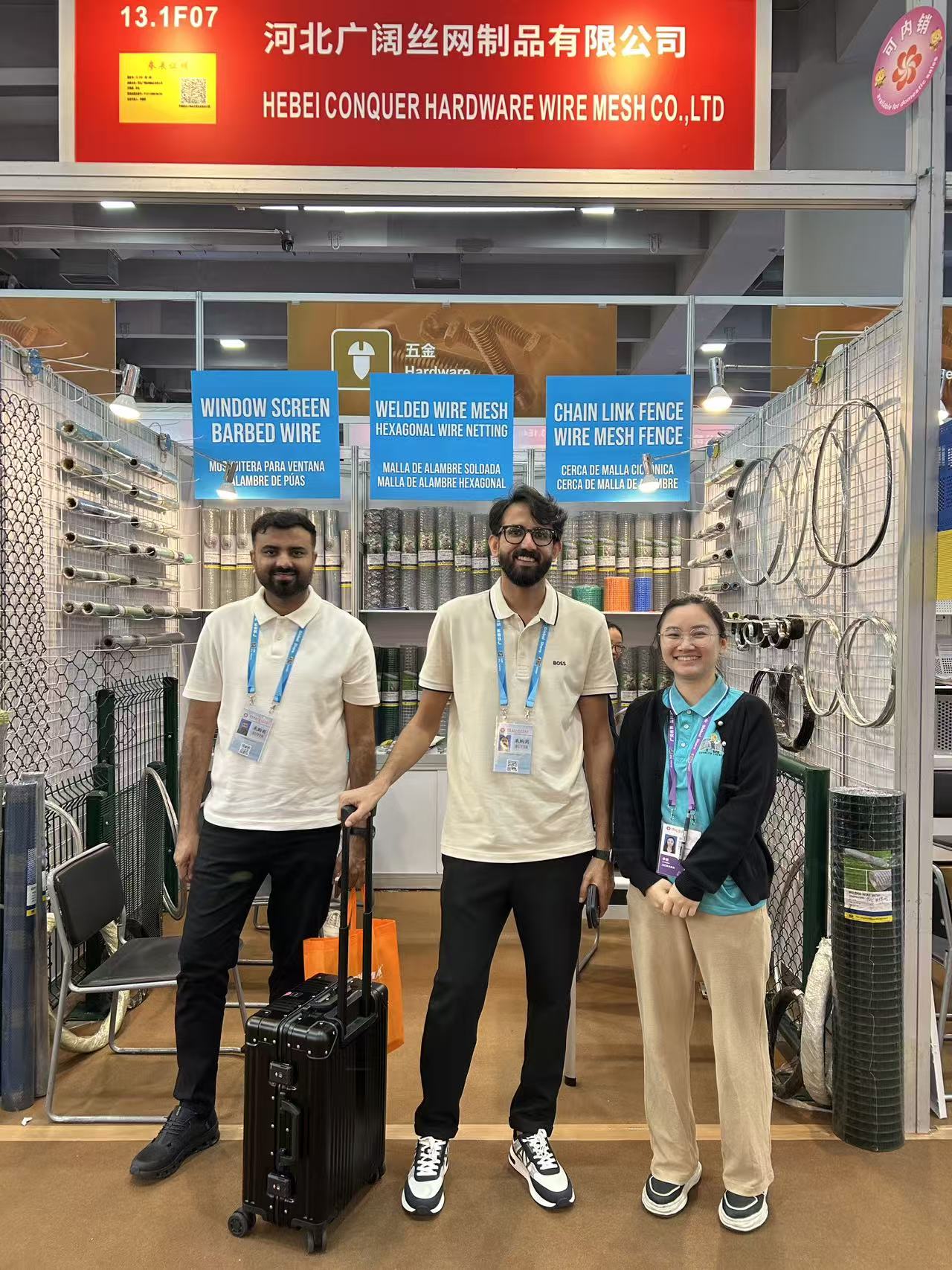 Client at security fence display.