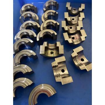 Machining mold components according to drawings