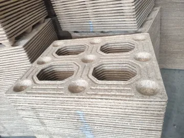 Title: **Fumigation-Free Nestable Compressed Wood Pallet**