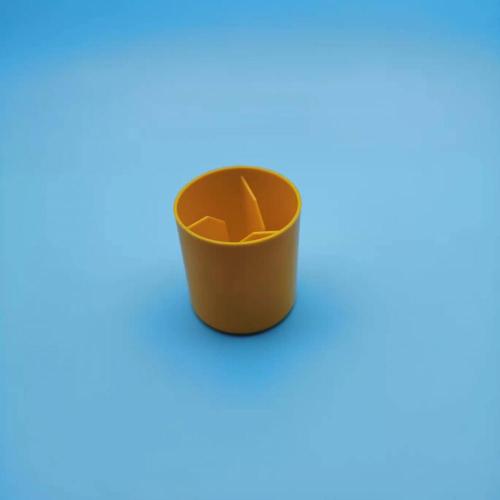 Yellow plastic rebar caps for building construction