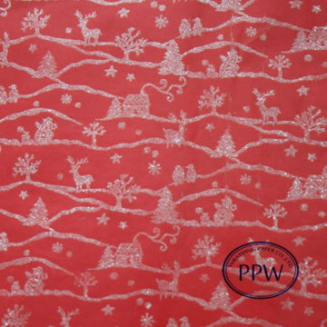 silver glitter on red paper wrapping gift